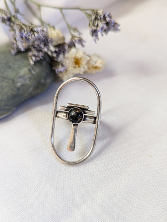 Sterling silver ring with copper obsidian stone made by designer in California. Moderne and exclusive look