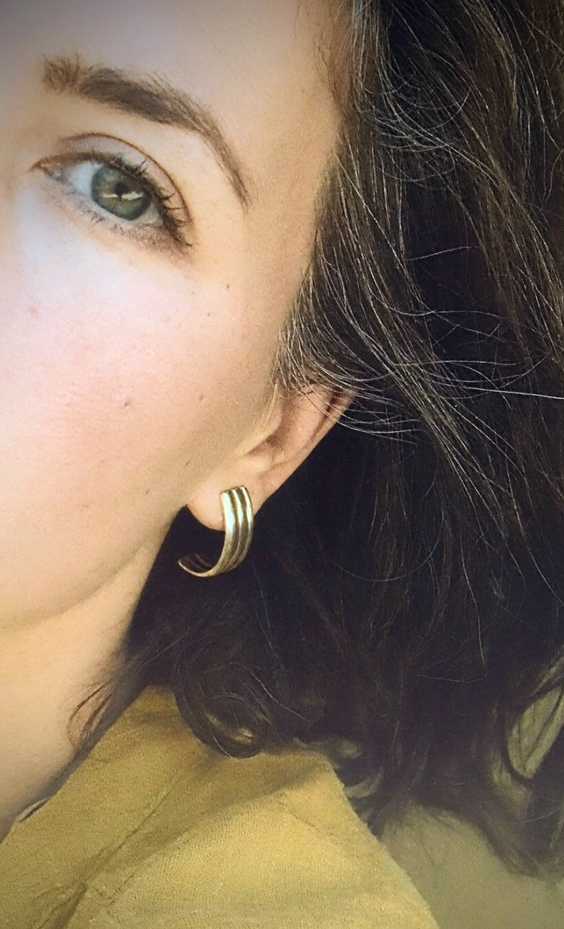 Semi Hoops earrings designed in sterling silver, lightweight and elegant. Handmade by designer